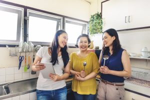 Family of asian women in the kitchen free image